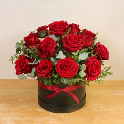 The Allure Hatbox is a creative hat box arrangement full of gorgeous large headed red roses. This beautiful bouquet of fresh hand tied flowers is perfect for any occassion.