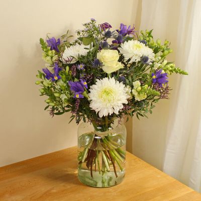 Elegant and eye catching, this bouquet of hand cut flowers features Iris, Chrysanthemum and Lisianthus in vibrant colours. The ideal gift for a loved one on any occasion, our flowers are ethically sourced and sustainable. This bouquet will be handcrafted by an experienced florist, order for same day delivery by hand, or next day delivery via our courier.