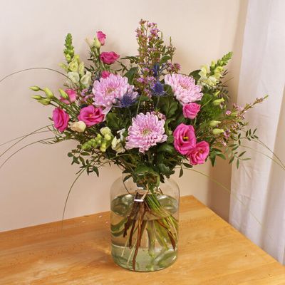 A classic, handcrafted bouquet of Antirhinum, Chrysanthemum and Lisianthus, these beautiful flowers will fill you with awe and make you drop your jaw! Available for same day delivery, these are the ideal last minute Mother's Day gift.